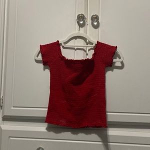 red crop top off the shoulder